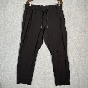 Lululemon On the Fly 7/8 Pant Black Womens Size 12 Mid Rise Drawstring Athletic